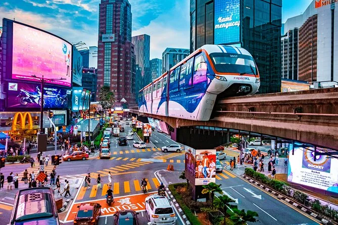 The monorail running on its track above a busy Bukit Bintang street