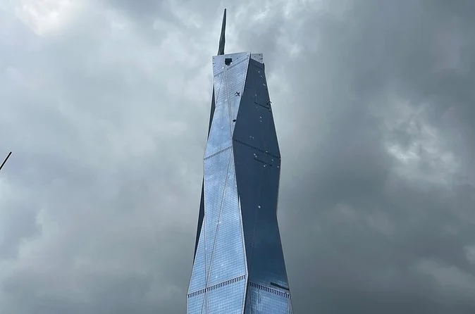 The Merdeka 118 tower rising into cloud above Kuala Lumpur